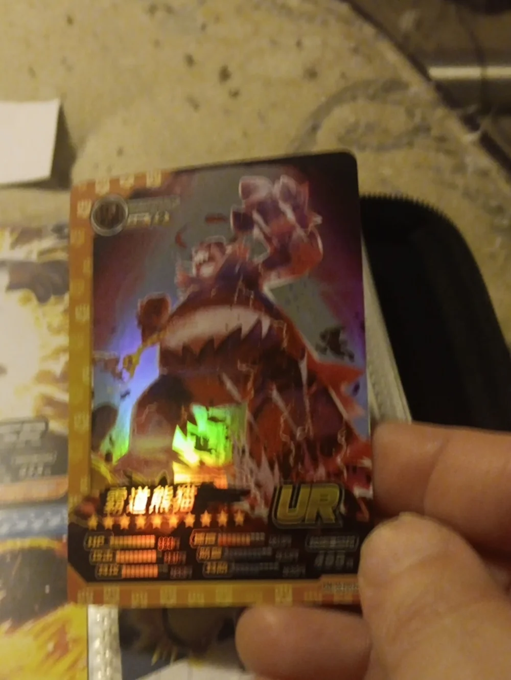 Red UR Holographic Card